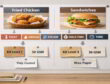 Illustrated spec wall mapping Fried Chicken and Sandwiches from Heat · Grease · Steam · Hold Time to Kit Level & GSM swatches.